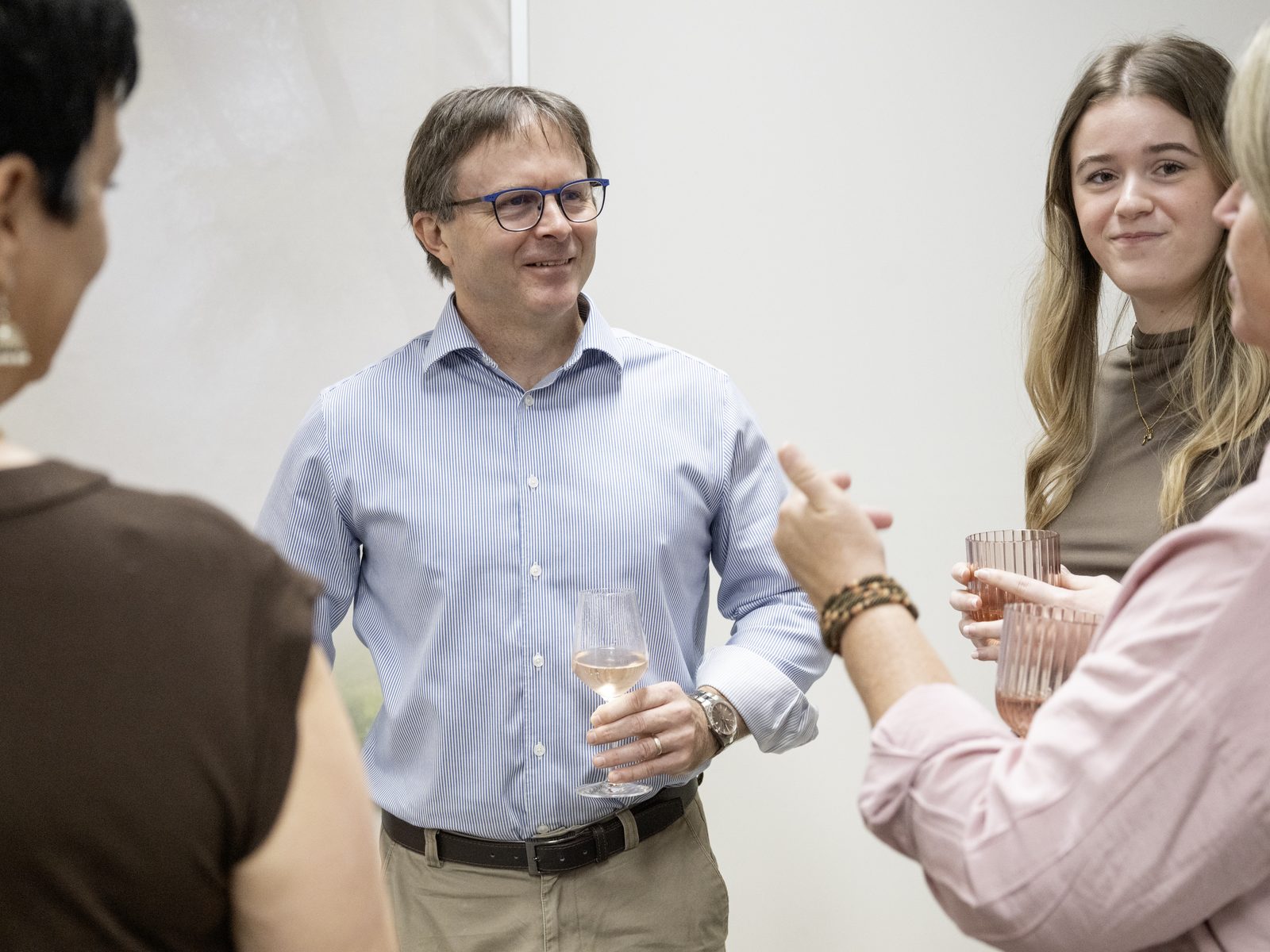 Team members sharing a laugh together at a practice gathering
