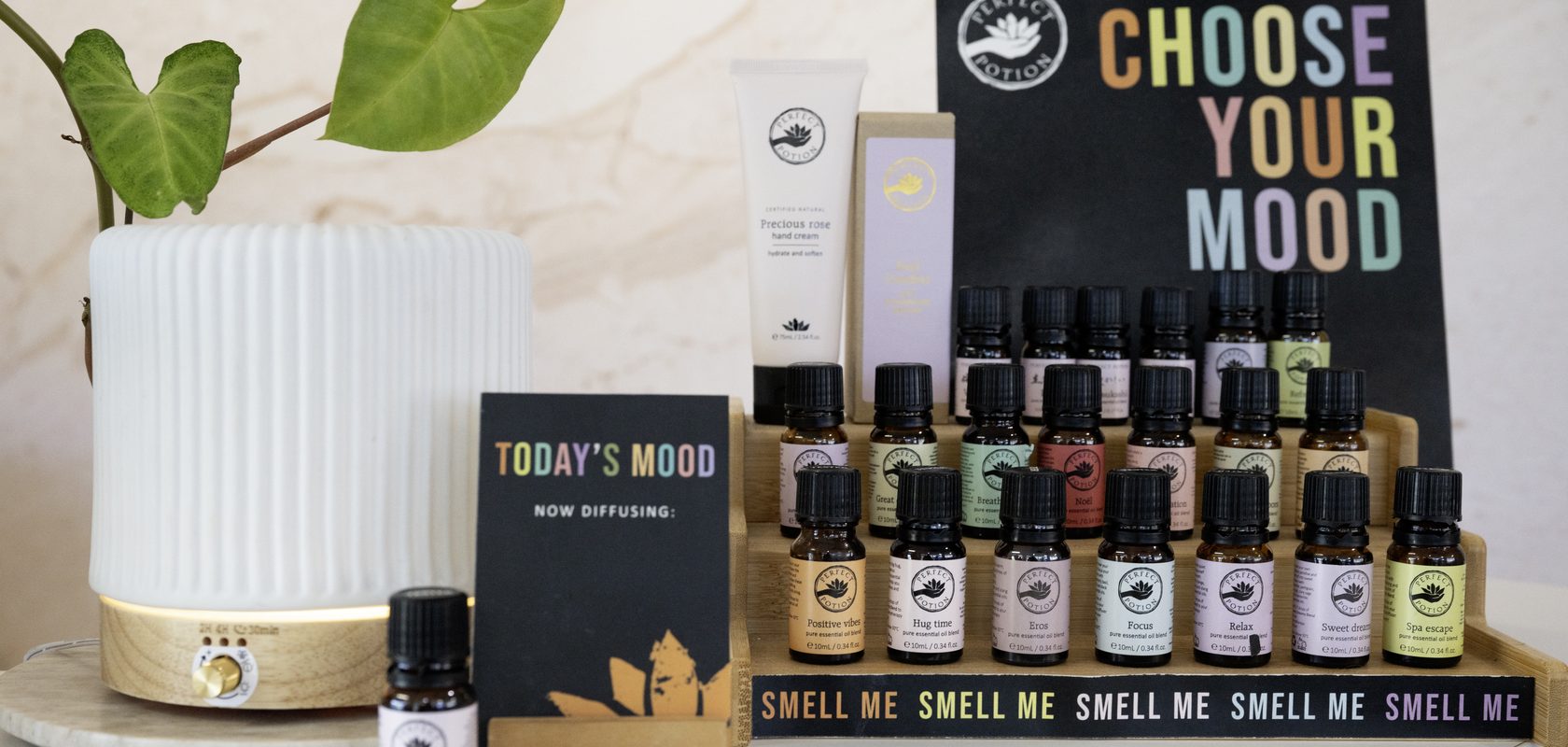 The 'choose your mood' essential-oil display beside a diffuser